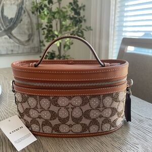 SOLD…..Coach Signature Crystal Trail bag